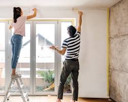 Homeowner performing seasonal maintenance inside a luxury apartment in Bangalore